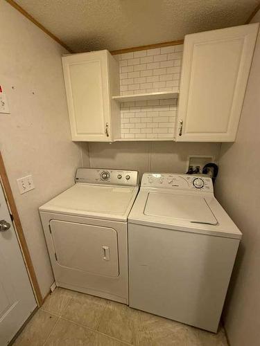 10117 100 Street, Nampa, AB - Indoor Photo Showing Laundry Room