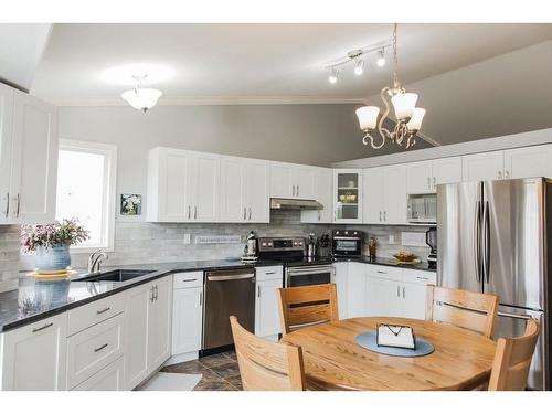 10142 115 Avenue, Grande Prairie, AB - Indoor Photo Showing Kitchen With Stainless Steel Kitchen With Upgraded Kitchen