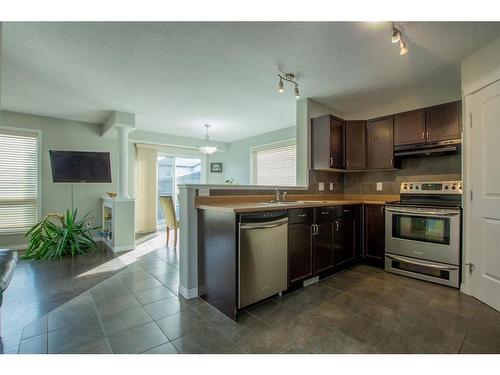 10225 85B Street, Grande Prairie, AB - Indoor Photo Showing Kitchen With Stainless Steel Kitchen