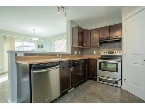 10225 85B Street, Grande Prairie, AB - Indoor Photo Showing Kitchen With Stainless Steel Kitchen