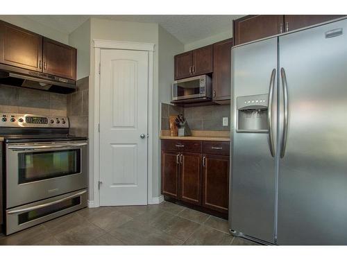 10225 85B Street, Grande Prairie, AB - Indoor Photo Showing Kitchen With Stainless Steel Kitchen