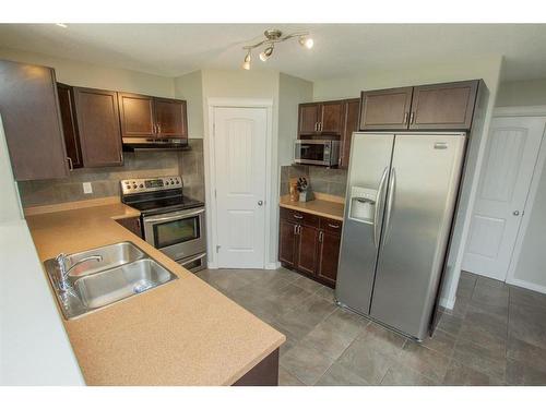 10225 85B Street, Grande Prairie, AB - Indoor Photo Showing Kitchen With Stainless Steel Kitchen With Double Sink