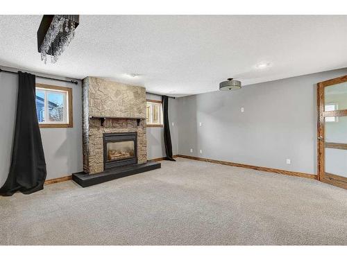 739 Oak Drive, Beaverlodge, AB - Indoor Photo Showing Living Room With Fireplace