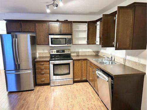 310-10150 121 Avenue, Grande Prairie, AB - Indoor Photo Showing Kitchen With Double Sink