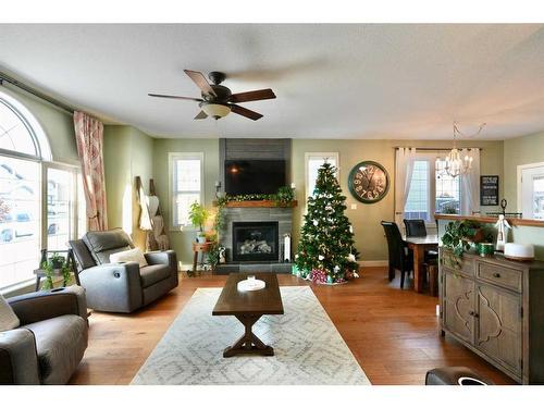 9122 133 Avenue, Peace River, AB - Indoor Photo Showing Living Room With Fireplace