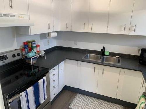 4314 54 Street, Grimshaw, AB - Indoor Photo Showing Kitchen With Double Sink