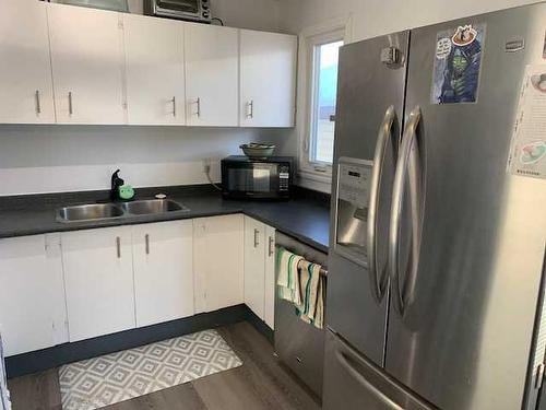 4314 54 Street, Grimshaw, AB - Indoor Photo Showing Kitchen With Double Sink