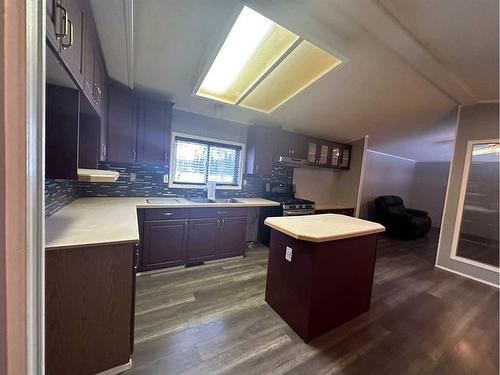 37 Banff Avenue, Rainbow Lake, AB - Indoor Photo Showing Kitchen With Double Sink