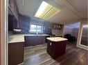 37 Banff Avenue, Rainbow Lake, AB  - Indoor Photo Showing Kitchen With Double Sink 