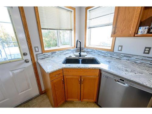 12509 98 Street, Grande Prairie, AB - Indoor Photo Showing Kitchen With Double Sink