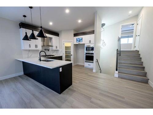 13013 104B Street, Grande Prairie, AB - Indoor Photo Showing Kitchen With Upgraded Kitchen