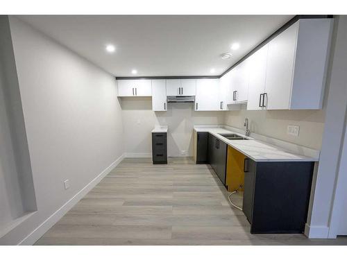 13013 104B Street, Grande Prairie, AB - Indoor Photo Showing Kitchen With Double Sink