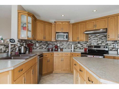 10007 104 Street, Sexsmith, AB - Indoor Photo Showing Kitchen With Double Sink