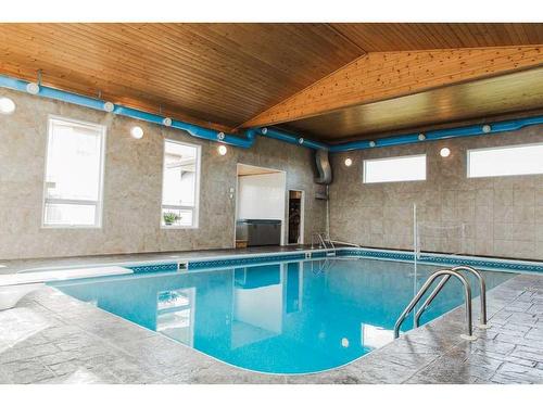 10007 104 Street, Sexsmith, AB - Indoor Photo Showing Other Room With In Ground Pool