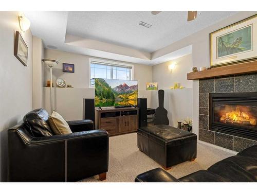 9874 67 Avenue, Grande Prairie, AB - Indoor Photo Showing Living Room With Fireplace