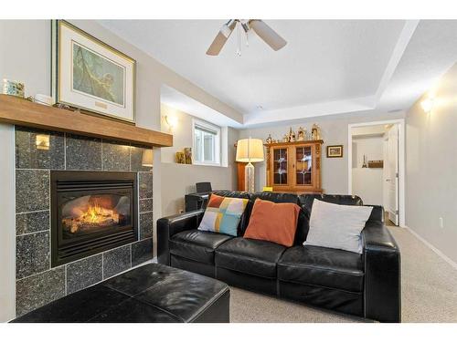 9874 67 Avenue, Grande Prairie, AB - Indoor Photo Showing Living Room With Fireplace