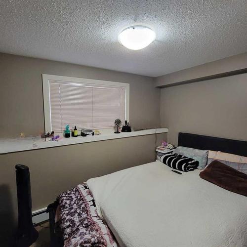 106-9005 99 Street, Peace River, AB - Indoor Photo Showing Bedroom