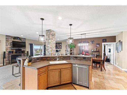 7626 Abbey Lane, Rural Grande Prairie No. 1, County Of, AB - Indoor Photo Showing Kitchen With Fireplace