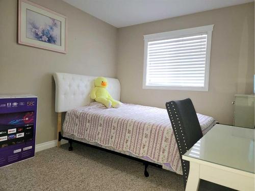 8466 102 Avenue, Grande Prairie, AB - Indoor Photo Showing Bedroom