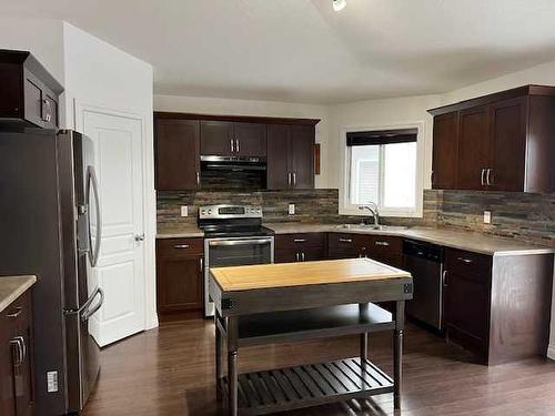 10913 60 Avenue, Grande Prairie, AB - Indoor Photo Showing Kitchen With Stainless Steel Kitchen With Double Sink