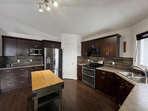 10913 60 Avenue, Grande Prairie, AB - Indoor Photo Showing Kitchen With Stainless Steel Kitchen With Double Sink