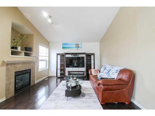 8813 88B Street, Grande Prairie, AB - Indoor Photo Showing Living Room With Fireplace