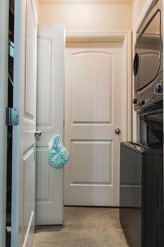 27 Pinnacle Crossing, Grande Prairie, AB - Indoor Photo Showing Laundry Room