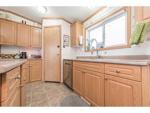 9003 85 Avenue, Grande Prairie, AB - Indoor Photo Showing Kitchen With Double Sink