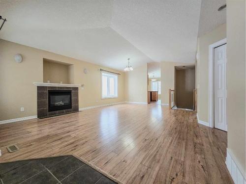 17-131 Moberly Road, Grande Cache, AB - Indoor Photo Showing Living Room With Fireplace