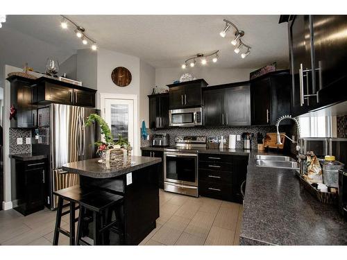 11813 87 Street, Grande Prairie, AB - Indoor Photo Showing Kitchen With Double Sink