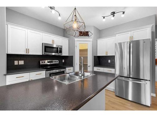 9434 Willow Drive, Grande Prairie, AB - Indoor Photo Showing Kitchen With Double Sink