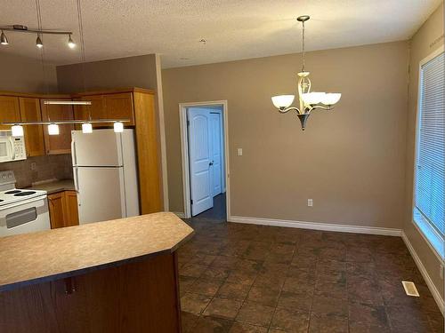 206-9225 Lakeland Drive, Grande Prairie, AB - Indoor Photo Showing Kitchen