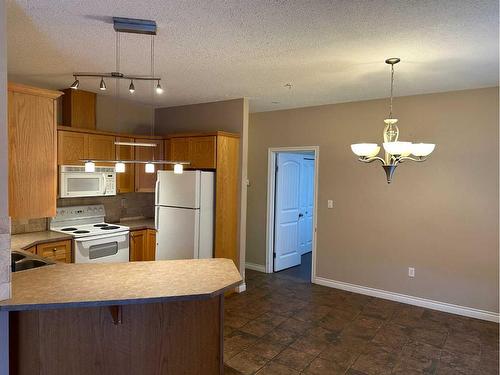 206-9225 Lakeland Drive, Grande Prairie, AB - Indoor Photo Showing Kitchen