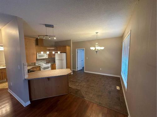 206-9225 Lakeland Drive, Grande Prairie, AB - Indoor Photo Showing Kitchen