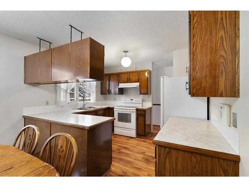 9670 76 Avenue, Grande Prairie, AB - Indoor Photo Showing Kitchen With Double Sink