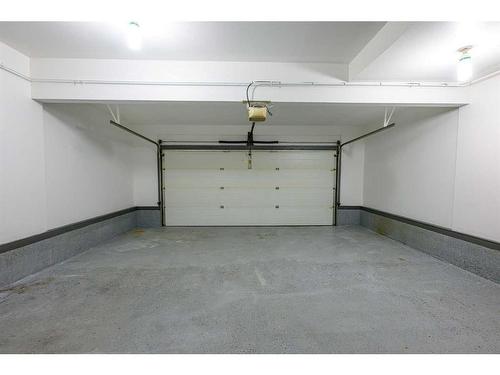 8545 102A Avenue, Grande Prairie, AB - Indoor Photo Showing Garage