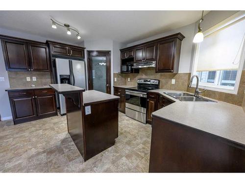 8545 102A Avenue, Grande Prairie, AB - Indoor Photo Showing Kitchen With Double Sink