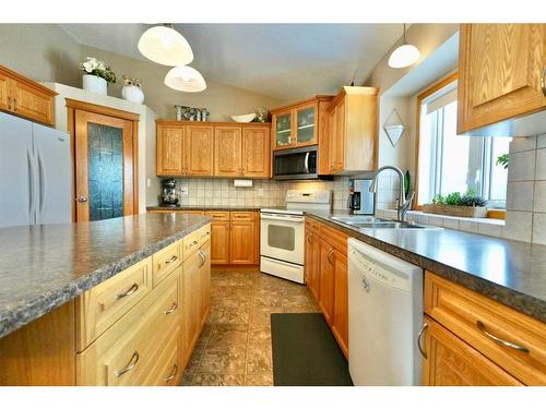 82356 Range Road 214, Rural Northern Sunrise County, AB - Indoor Photo Showing Kitchen With Double Sink