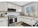 6918 99A Street, Grande Prairie, AB  - Indoor Photo Showing Kitchen With Double Sink 