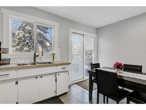 6918 99A Street, Grande Prairie, AB - Indoor Photo Showing Kitchen With Double Sink