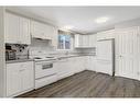 101-10550 111 Street, Grande Prairie, AB  - Indoor Photo Showing Kitchen 