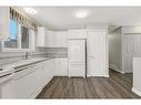 101-10550 111 Street, Grande Prairie, AB  - Indoor Photo Showing Kitchen 