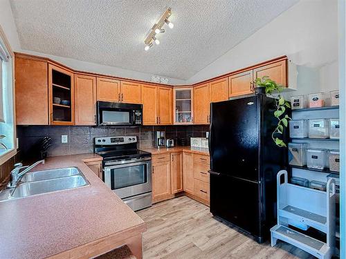 13002 93A Street, Grande Prairie, AB - Indoor Photo Showing Kitchen With Double Sink