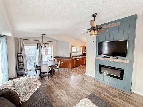 13002 93A Street, Grande Prairie, AB - Indoor Photo Showing Living Room With Fireplace