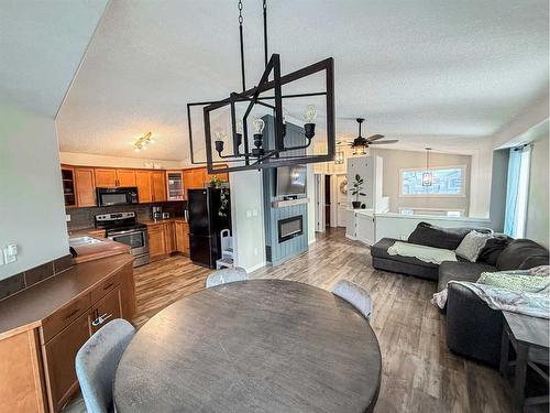 13002 93A Street, Grande Prairie, AB - Indoor Photo Showing Living Room With Fireplace