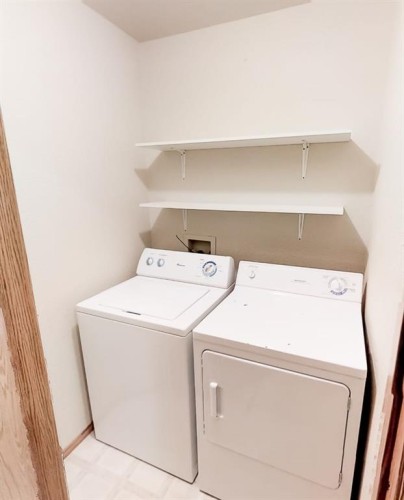 C-10029 105 Avenue, Grande Prairie, AB - Indoor Photo Showing Laundry Room