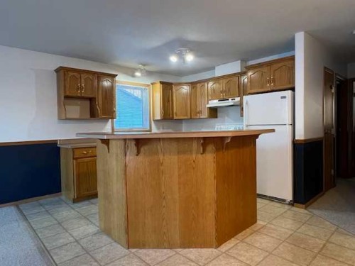 7A & 7B Pembina Road, Rainbow Lake, AB - Indoor Photo Showing Kitchen