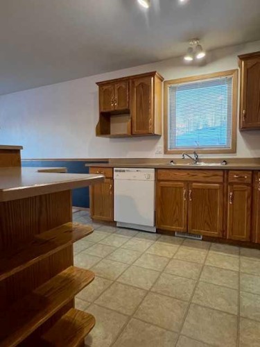 7A & 7B Pembina Road, Rainbow Lake, AB - Indoor Photo Showing Kitchen