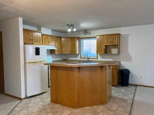 7A & 7B Pembina Road, Rainbow Lake, AB - Indoor Photo Showing Kitchen