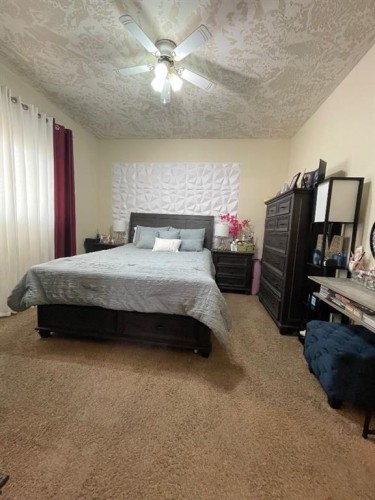 5069 Cornerstone, High Prairie, AB - Indoor Photo Showing Bedroom